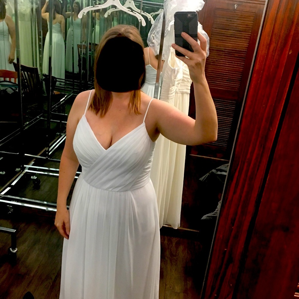 White floor length gown.